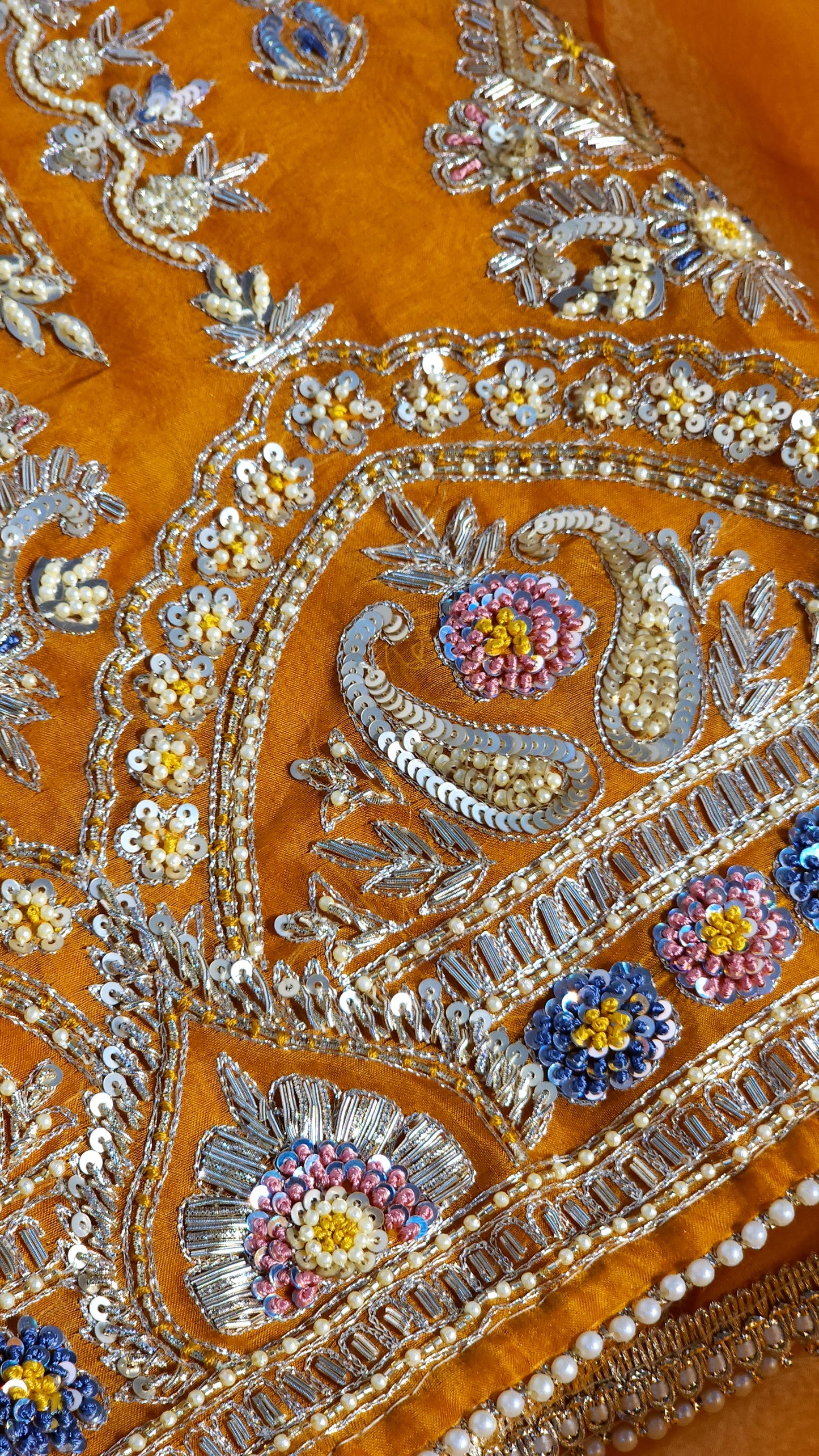 Orange shade suit with Zari work designed
