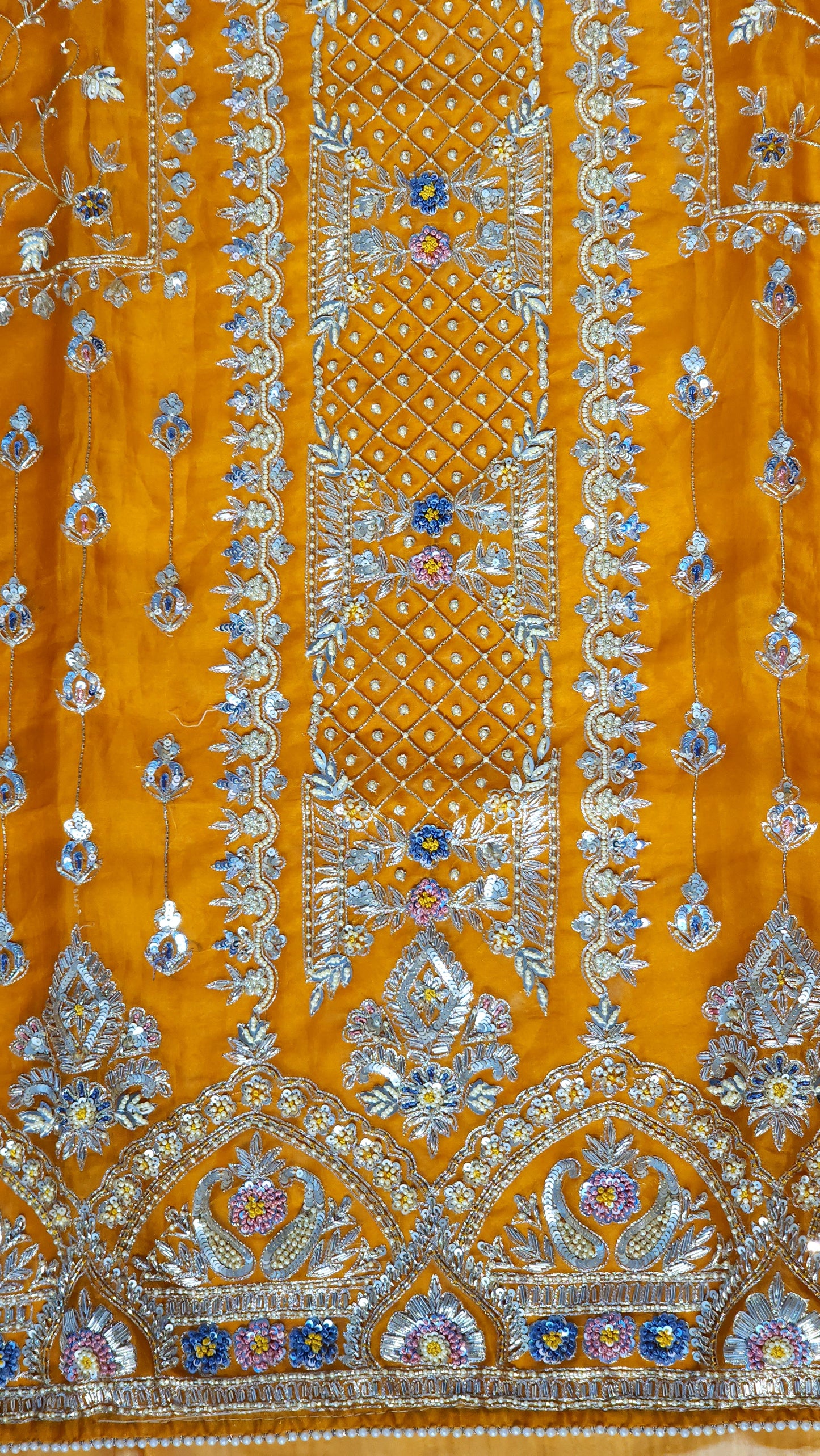 Orange shade suit with Zari work designed