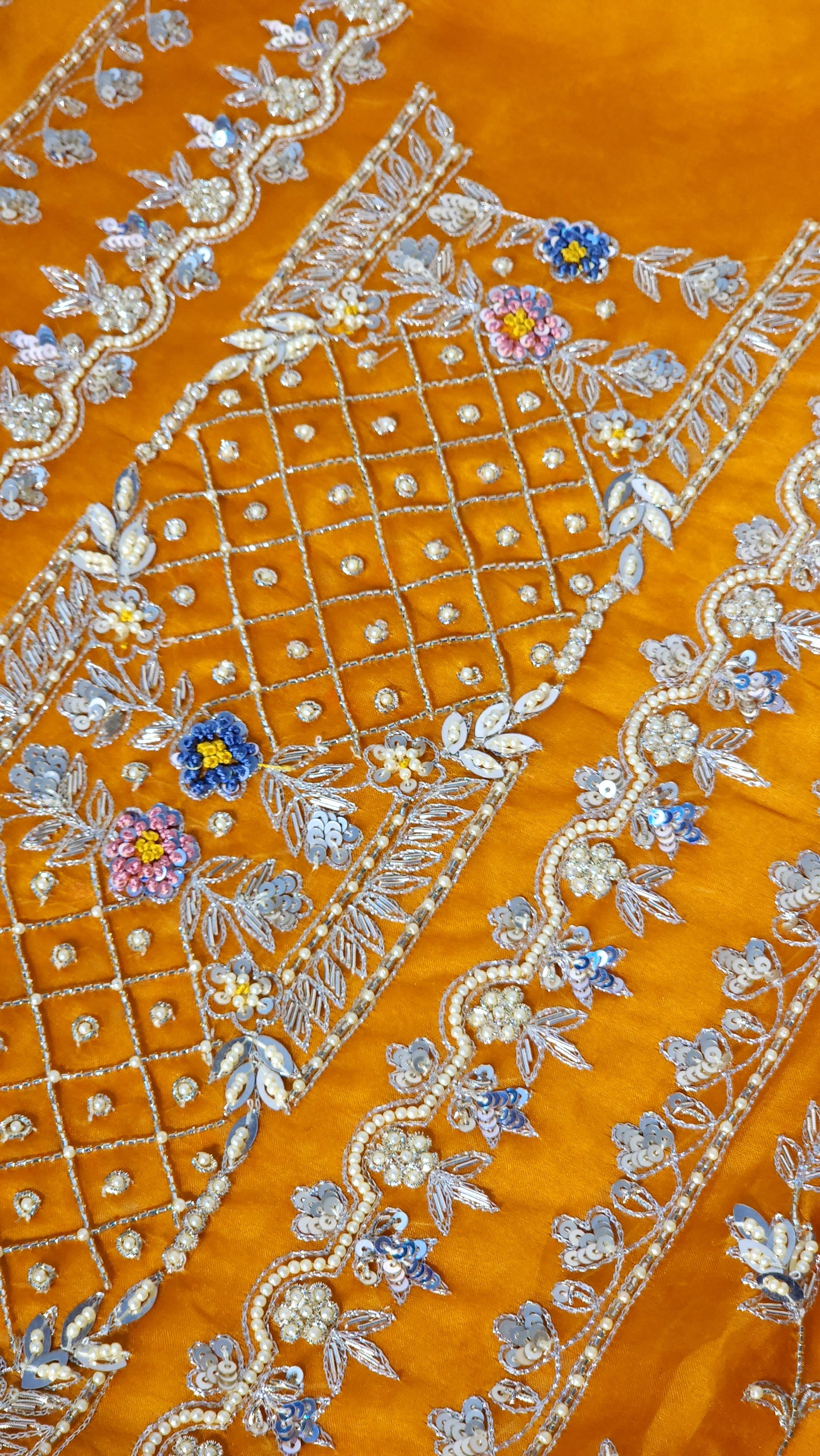 Orange shade suit with Zari work designed