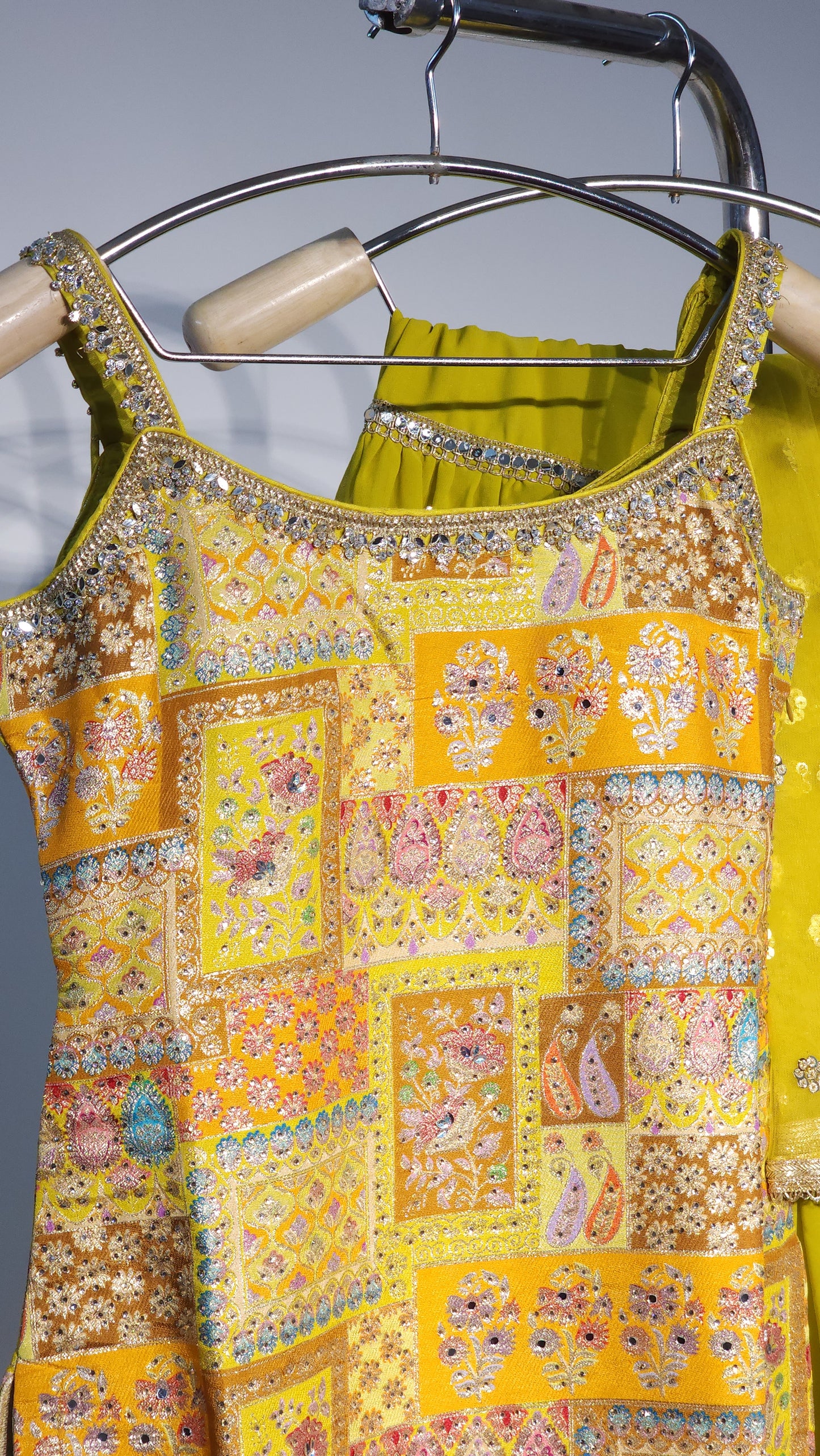 Stunning yellow embroidery sleeveless sharara set